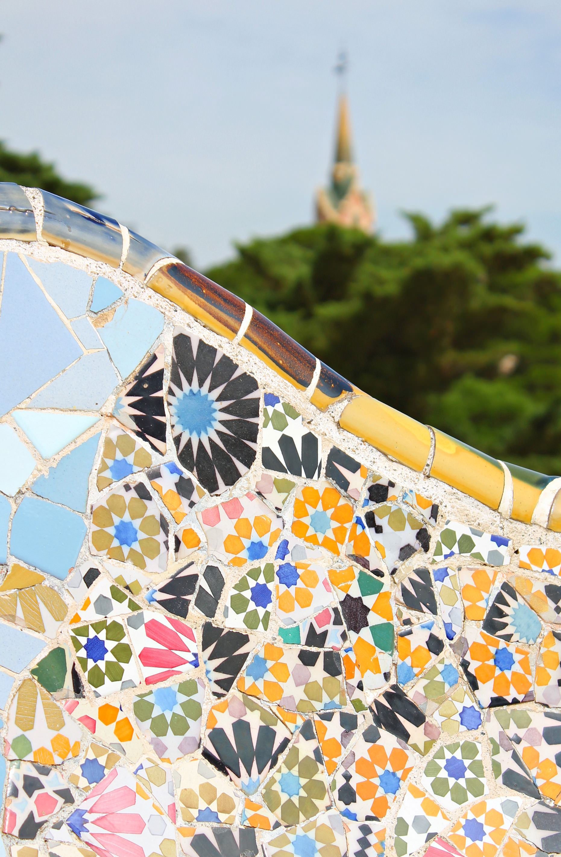 Gaudi_yellow_tile_mosaics_Park_Guell_Little_Big_Bell
