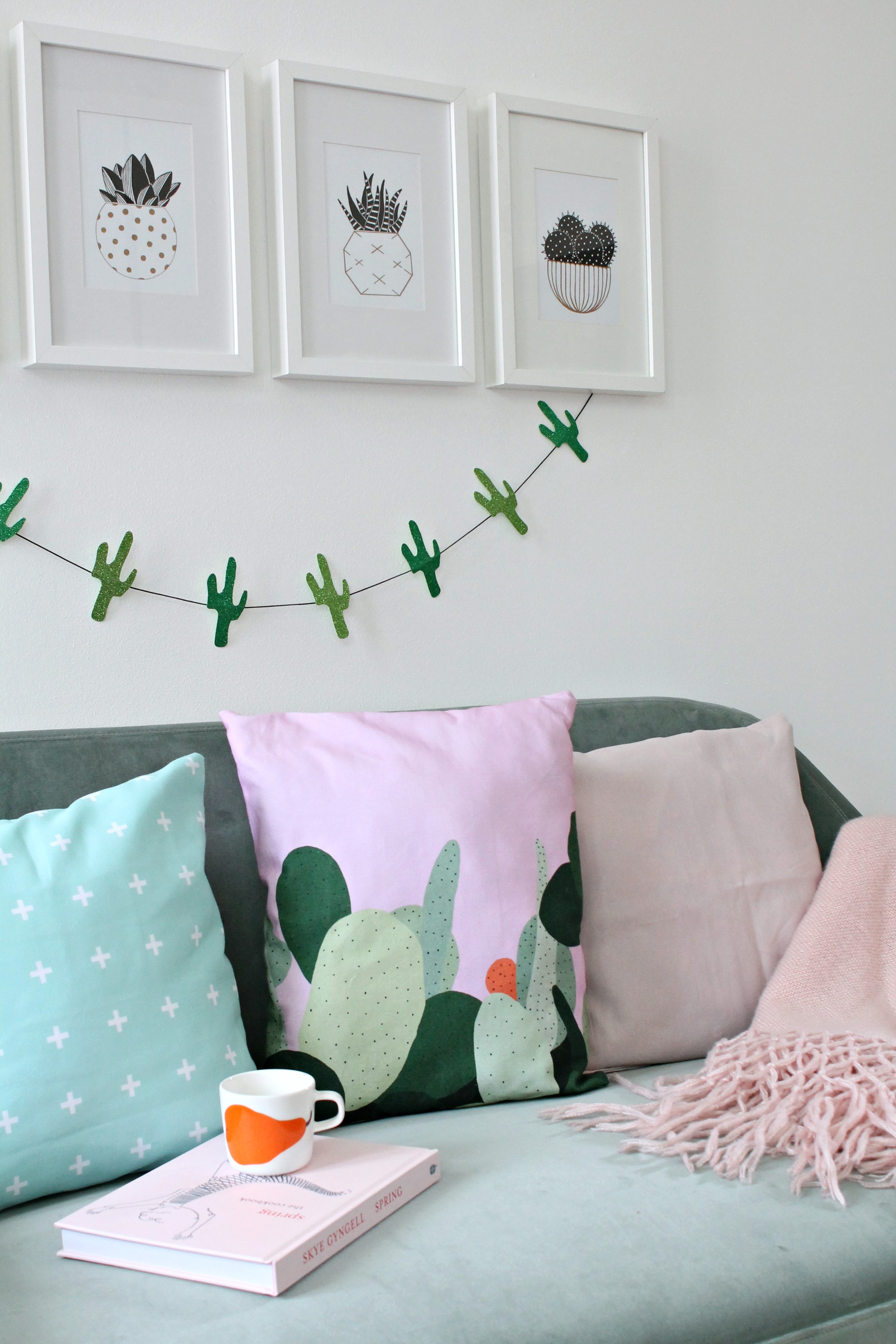 Green-velvet-sofa-with-pink-photo-and-styling-by-Geraldine-Tan-Little-Big-Bell