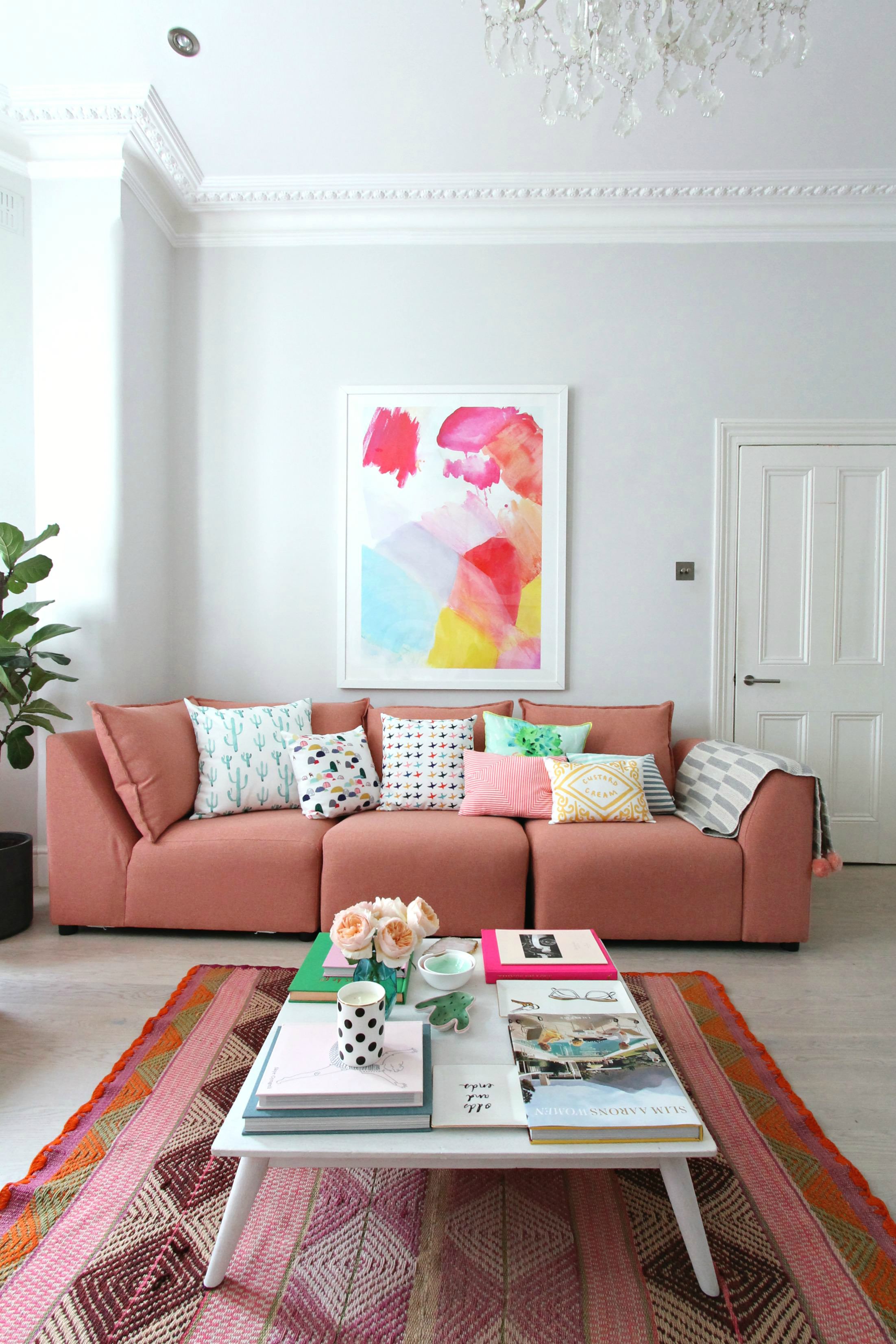 how to style a pink sofa